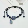 Pulsera de Cerámica Jingdezhen Nueva Pulsera de Cerámica China Joyería Estudiante Estilo Tíbet Cuerda Trenzada a Mano Puesto Regalo para Estudiante