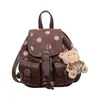 Mochila elegante y moderna con un diseño único, alto atractivo estético, bolso de mujer de nicho y a la moda, mochila versátil y casual, mochila escolar de lunares