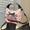 Bolsa de Ombro Feminina de Comércio Exterior de Alta Qualidade 2026 Nova Tendência Moda Verão Bolsa Tote Casual Versátil Bolsa Transversal