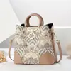 Bolso de Mano Estampado de Brocado Zhuang de Guangxi Moda Versátil Bolso de Mujer Textura Simple Bolso Cubo Hombro Único Cruzado Mediano