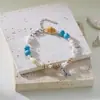 Europa e Estados Unidos transfronteiriço novo rabo de peixe concha contas de arroz pulseira praia estrela-do-mar pingente concha cristal contas pulseira atacado