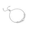 Pulseira Cruzada de Diamante Esmeralda Vendida Quente para Mulheres Temperamento Luxo Leve Sensação de Alto Padrão Tipo Puxador Ajustável Joia de Mão Europeia e Americana