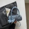 Bolsa de ombro fofa e doce estilo coreano, elegante e versátil, bolsa transversal de grande capacidade, bolsa de mão com alto valor estético, color blocking para mulheres