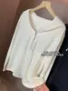 Camiseta de manga larga con capucha y media cremallera para mujer, mezcla de algodón con tacto a lino de calidad Gao, estilo nuevo otoño 2026