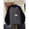 Suéter de hombre con bloques de color, media cremallera, cuello alto, corte holgado, marca de moda, mangas tejidas raglán, top pullover casual para hombres jóvenes