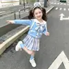 Conjunto de cárdigan tejido Cinnamoroll para bebé niña con falda 2024 nuevo estilo uniforme jk para niña pequeña conjunto de tres piezas de otoño