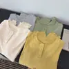Nueva camiseta de moda estilo coreano con cuello redondo y manga larga para mujer, holgada y estilosa, top versátil con base de color liso texturizado para mujer