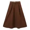 Falda de línea A para mujer con cinturón y doble bolsillo, color liso, nueva moda de principios de primavera, estilo retro, que cubre la cadera, adelgazante, media falda de algodón lavado