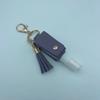 Funda de cuero sin desinfectante de manos de PU, llavero con borla para spray, botella vacía de spray de perfume desinfectante, llavero de funda de cuero