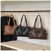 Bolsa de Viagem Portátil Estilosa e Moderna para Mulheres 2025 Novo Estilo Coreano Casual Grande Capacidade Bolsa Transversal Bolsa de Bagagem