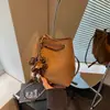 Este año, los bolsos tipo cubo de estampado de leopardo de moda son tendencia en el mercado de exportación.. Aquí está la nueva colección 2026: un bolso de hombro y bandolera retro y versátil para mujer