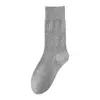 Calcetines largos de mujer con patrón de rombos de doble puntada, calcetines de mujer estilo universitario coreano que hacen que las piernas se vean más delgadas, calcetines de media pantorrilla sin costuras y resistentes al olor para mujer