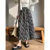 Saia vintage com estampa floral estilo coreano para mulheres, novo modelo de verão, saia plissada e fluida de comprimento médio, linha A solta com barra larga em formato de guarda-chuva