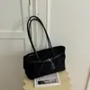 Bolso de mano de nicho muy elegante y casual estilo coreano, nuevo 2026 vintage color liso bolso relajado para el hombro y debajo del brazo