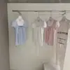 WGWE9211 Guangzhou Treze Hong Roupas Femininas 2026 Nova Camisa Top Manga Curta Pregueada com Amarração Francesa Cintura Marcada Verão
