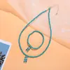 Conjunto de colar e pulseira estilo boho europeu e americano com contas de arroz e pingente de urso fofo atacado