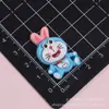 Acessórios de cola cremosa do Doraemon em desenho animado, enfeites para fivelas de sapato, materiais de resina para artesanato DIY, adesivos para capa de celular