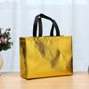 Fabricantes de bolsas no tejidas plegables de oro y plata con película de impresión a color, bolsas no tejidas, bolsas láser, bolsas de regalo