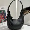 Bolsa de Ombro Estilosa Retro Fashion 2025 Novo Design de Nicho Couro Genuíno Versátil para o Dia a Dia Bolsa de Ombro de Mão
