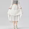Diseño elegante con pliegues irregulares, falda de longitud media, moda versátil de principios de otoño 2026, falda tulipán A13714