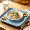 Juego de vajilla de cerámica estilo Ins, que incluye cuencos, platos, una tetera elegante, una taza y un plato con forma de pétalo - una combinación de utensilios de cocina lujosa y estéticamente agradable para uso doméstico