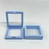 Cajas flotantes en stock directamente del fabricante, venta al por mayor por caja, empaque de almacenamiento para joyería, exhibidor de llaveros de juguete