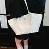 Bolso tote bolso nuevo hombro único mujer gran capacidad retro 2026 para ir al trabajo temperamento simple popular verano