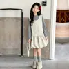 Conjunto de vestido con tirantes para niña 2026 otoño lindo vestido floral para niños mayores versátil vestido corto de dos piezas