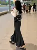 Falda negra de cola de pez para mujer, nueva colección otoño 2026, de cintura alta, falda midi de línea A, falda midi de punto adelgazante