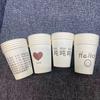 Taza desechable estilo ins engrosada comercial patrón de dibujos animados taza de papel para el hogar taza de leche de soja cara sonriente taza de agua al por mayor