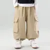 Otoño 2026 Nuevo Estilo Japonés Holgados Pantalones Cargo con Bolsillos Grandes para Niños Pantalones Casuales Elegantes para Niños de Primavera y Otoño