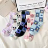 Calcetines de dibujos animados lindos para niños de algodón peinado de tubo medio para mujer calcetines de animación de dibujos animados calcetines casuales de moda venta al por mayor transfronteriza