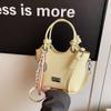Bolso de mano retro con textura popular de este año, bolso de hombro colgante para mujer, tendencia de primavera 2025, sencillo y combinable.
