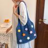 Bolsa de punto calada de nuevo estilo para el verano 2025, bolsa tejida de un solo hombro, gran capacidad, para el trabajo, bolsa tote floral de alta gama para mujer