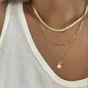 Colar duplo popular Shein com corrente de osso de cobra para mulheres, gargantilha vintage de osso de cobra de nicho de luxo leve de alta qualidade europeia e americana