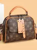 Bolso de Mano Versátil con Estampado Retro Texturizado de Gama Alta para Mujer 2025 Nuevo Elegante Bolso Cruzado de Hombro de Nicho para Viajes Diarios
