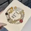 Eucalipto AzulDiseño Original Cristal Blanco Natural Oro Negro Pulsera de Cristal Doble Círculo Súper Estilo de Viaje Joyería de Mano para Mujer