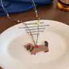 Colar com Pingente de Dachshund Mini Cerâmica Desenho Animado Fofo Feminino Outono e Inverno Corrente para Suéter de Nicho Acessórios Longos