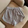 Pantalones cortos casuales de cintura alta de comercio exterior para mujer, nuevos pantalones cortos de verano con estampado de hueso de serpiente, pantalones deportivos de talla grande americanos, pantalones cortos de cintura ancha para primavera y verano.