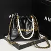 Bolso acolchado nuevo 2025 para mujer, Bolso de cadena de perlas de cuero genuino con letra de moneda estilo Chanel, Bolso de gran capacidad para basura