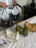 Bolsa Casual de Grande Capacidade de Alto Valor Feminina Verão 2026 Nova Estilo Coreano Transversal Moda Corrente Ombro Único Bolsa de Axila