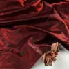 Tela de Lino de Seda Satinada de Color Sólido Verde Gema Brillante Esmaltada Tela para Vestido Estilo Chino con un Brillo Perlado