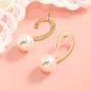Europa y Estados Unidos pendientes creativos exagerados curvos de perlas transfronterizos moda retro temperamento tendencia pendientes de viento frío