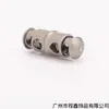 Hebilla elástica de metal de doble cabeza cilíndrica con dos agujeros para cordón, hebilla de resorte T5008