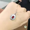 Explosiones plata pura repujada granate natural color vino tinto colgante estilo Joker femenino una generación de pelo
