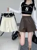 Pantalones versátiles para mujer para otoño e invierno 2026, nuevos pantalones de cuero PU de tiro alto que estilizan y caen, shorts negros rectos de pierna ancha para usar con botas