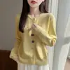 Cardigan de punto de punto fino con botones de concha de estrella de mar, cuello redondo, adelgazante, estilo nuevo de principios de primavera transfronterizo, suéter exterior de felpa Andy amarillo para mujer