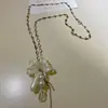 Collar de Flor de Lirio Estilo Coreano Estilo Ins con Perla y Cristal Gota de Agua, Cadena Dulce y Fresca de Suéter de Nicho