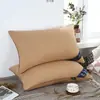 Un par de almohadas viene con una funda de almohada para dormir, núcleo de almohada de hotel, soporte para el cuello, uso doméstico, terciopelo de plumas para la siesta