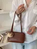Nova bolsa de axila de nicho de alta qualidade para mulheres no comércio exterior transfronteiriço, bolsa quadrada pequena texturizada, simples e fashion, bolsa de ombro para o dia a dia